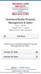 Mobile Screenshot of heartlandrealty.homesandland.com